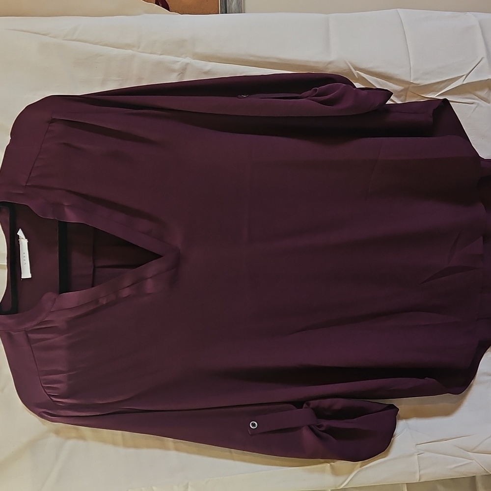 A Nice LUSH Top In Dark Burgundy/plum Color. It Is A Large.